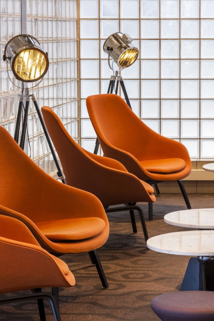 3 - Cafe zone with large-scale film floor lamps.jpg