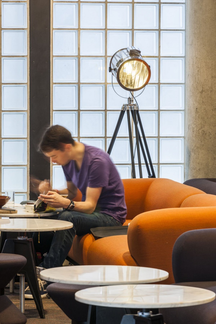 5 - Cafe zone is bordered by glass block walls.jpg