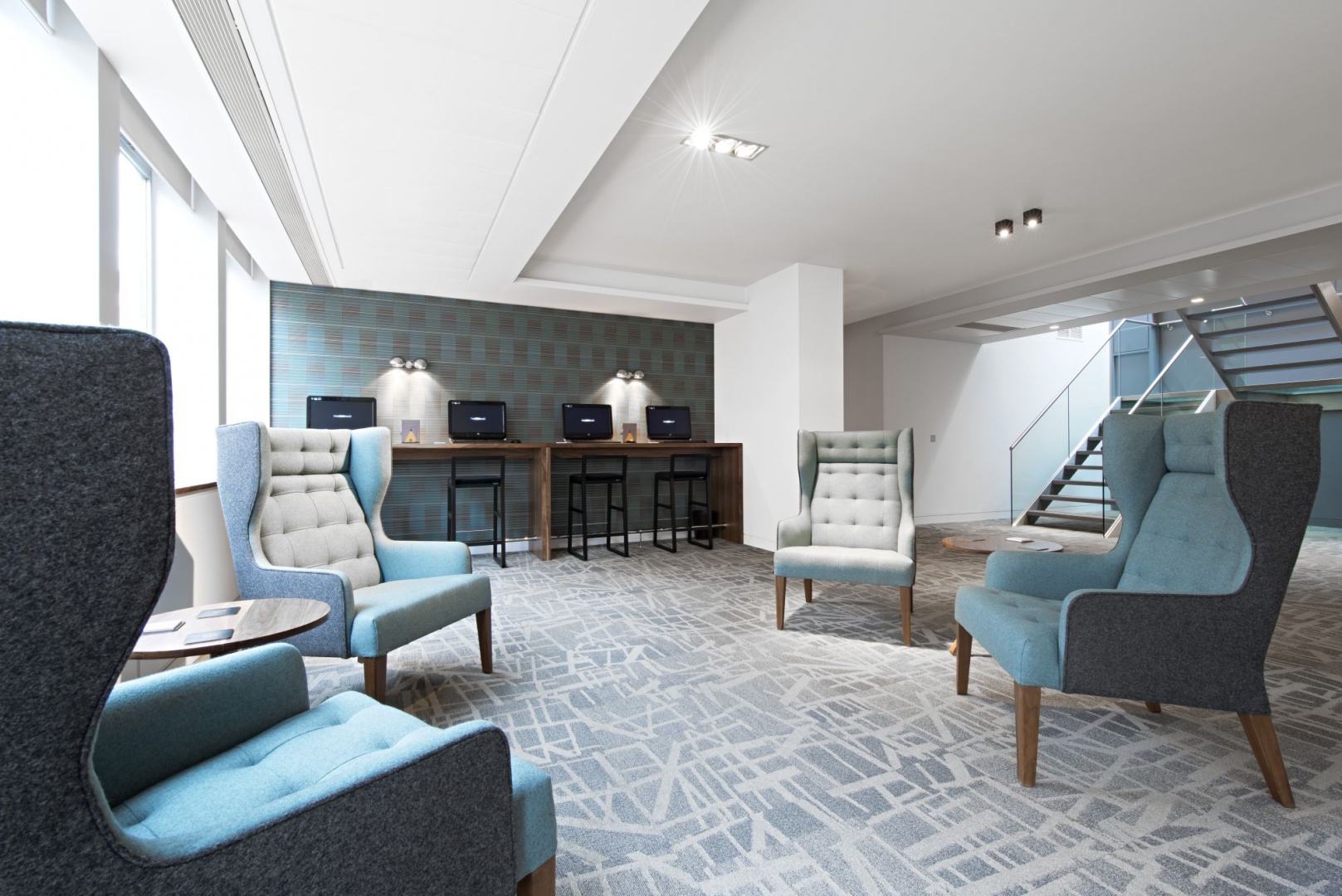 15. James UK Wingback Chairs in Meeting Zone.jpg