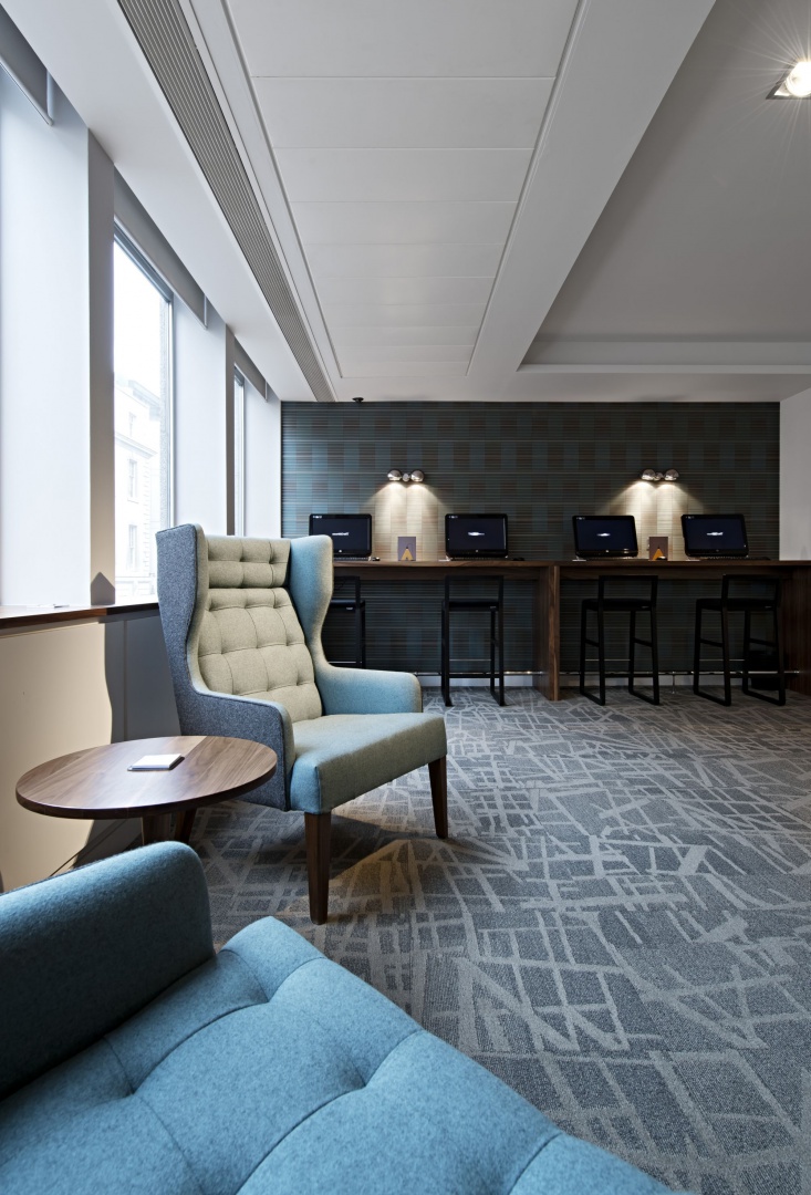 16. James UK Wingback Chairs in Meeting Zone (2).jpg